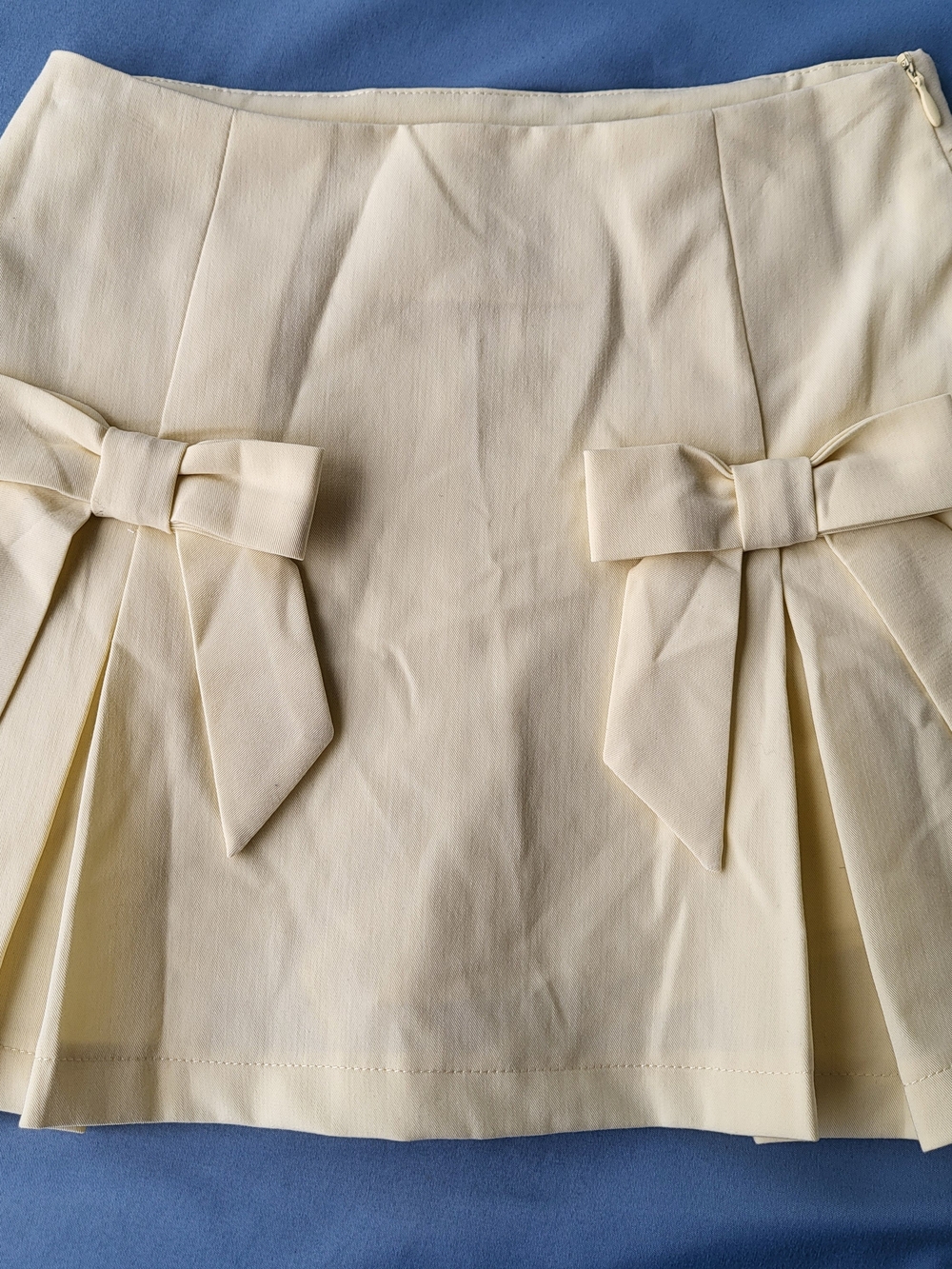 Altar'd State Cream Bow-Pleated Mini Skirt